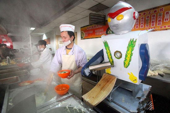 冬奥厨房机器人炒菜图片